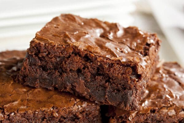 A close up of some brownies on top of each other