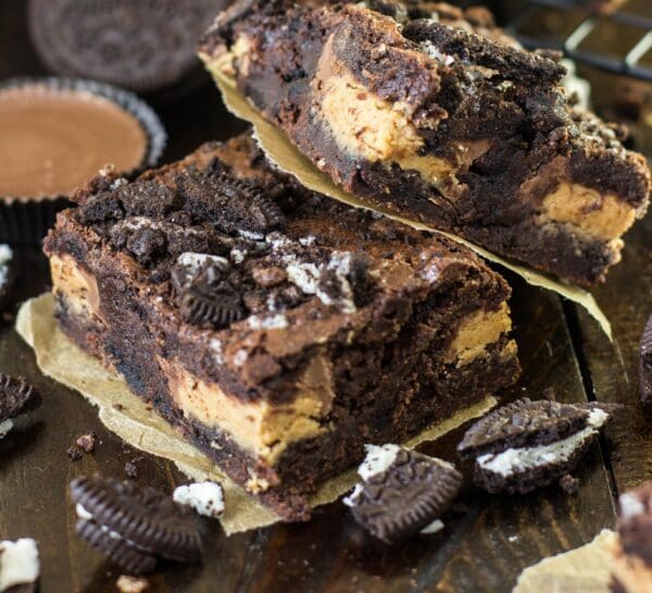 A close up of two brownies on top of a table