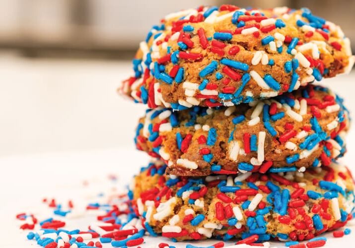 Patriotic sprinkle cookies stacked high.